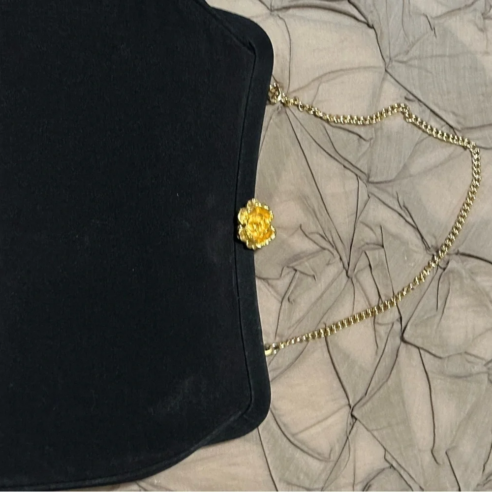 Elegant Black Clutch with Gold Accent Rose Clasp